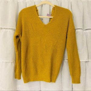 Francesca’s mustard sweater